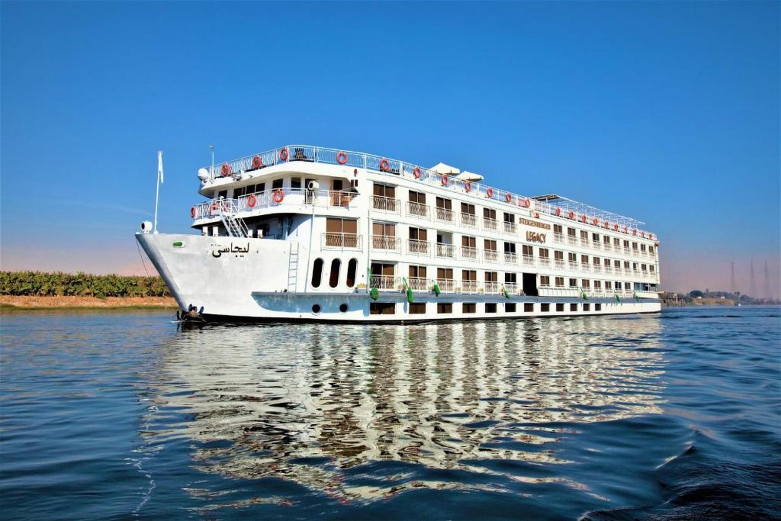 Steigenberger Legacy Nile Cruise sailing on the Nile River with luxury accommodations and panoramic river views
